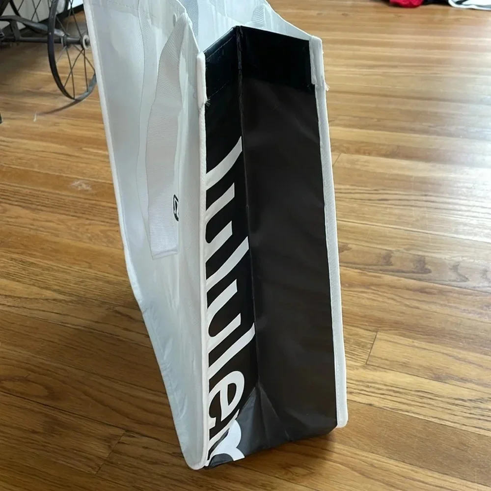 Lululemon reusable tote Snap closure. Black and white. 16” long x 14” wide x 6”